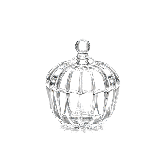 Fluted glass candy jar with lid on white