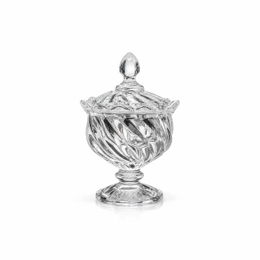 Swirl glass sugar bowl with lid on pedestal on white