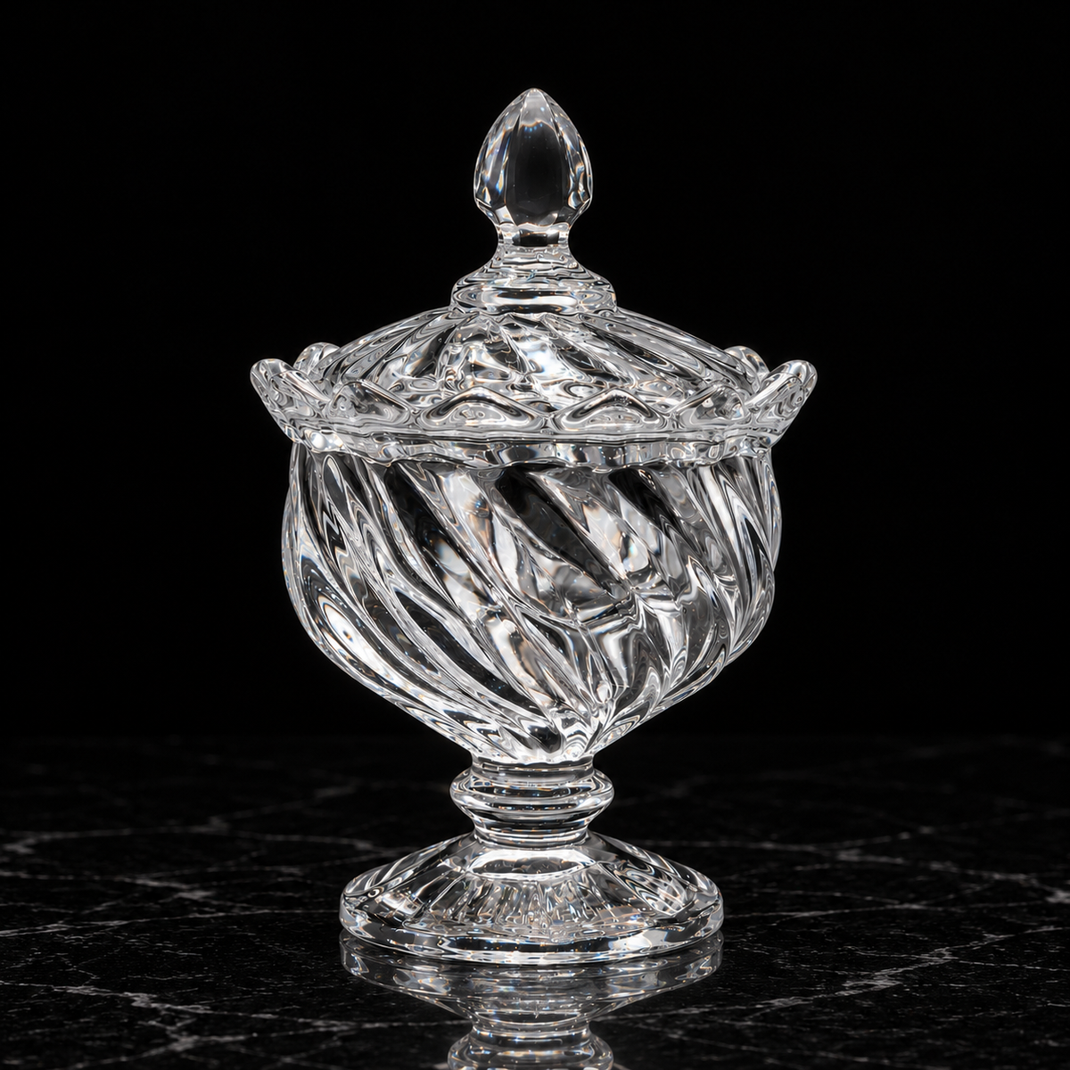 Swirl glass sugar bowl on black marble