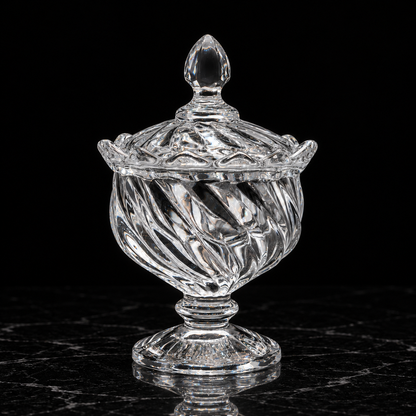 Swirl glass sugar bowl on black marble