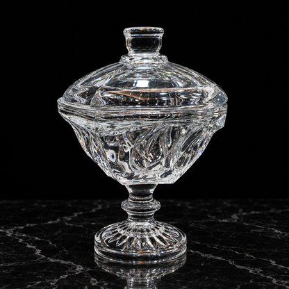 Crystal candy bowl with lid on black marble