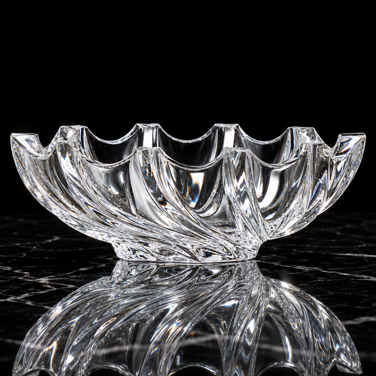 Crystal swirl fruit bowl on black marble