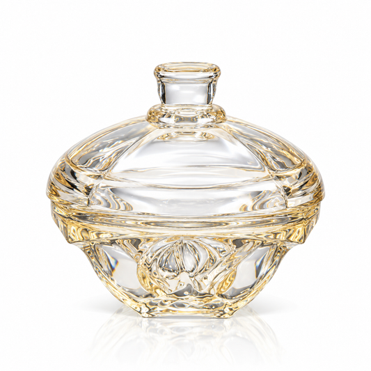 Amber glass candy bowl with lid on white