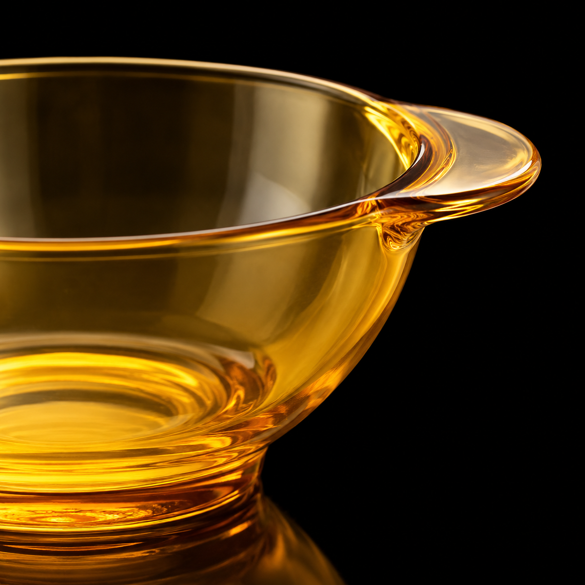 Close-up of the amber glass bowl handle and rim