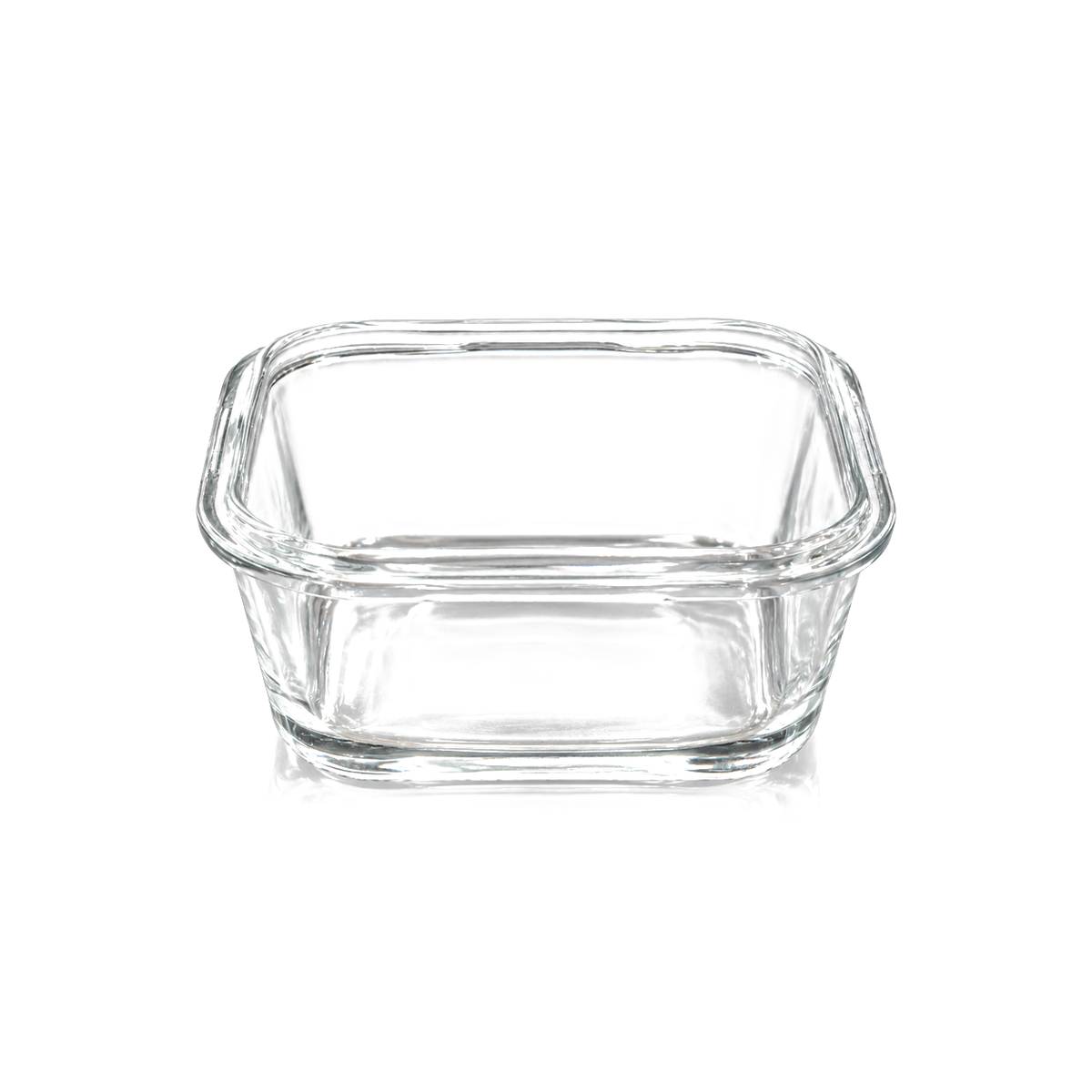 Small square clear glass dish on white