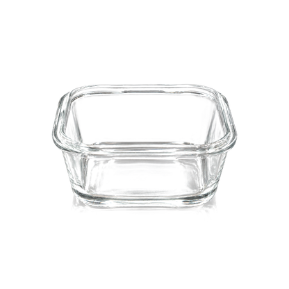 Small square clear glass dish on white