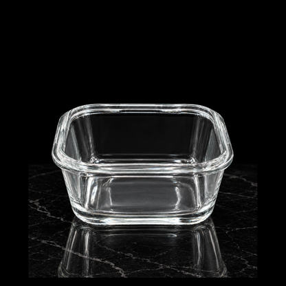 Square glass dish on black marble