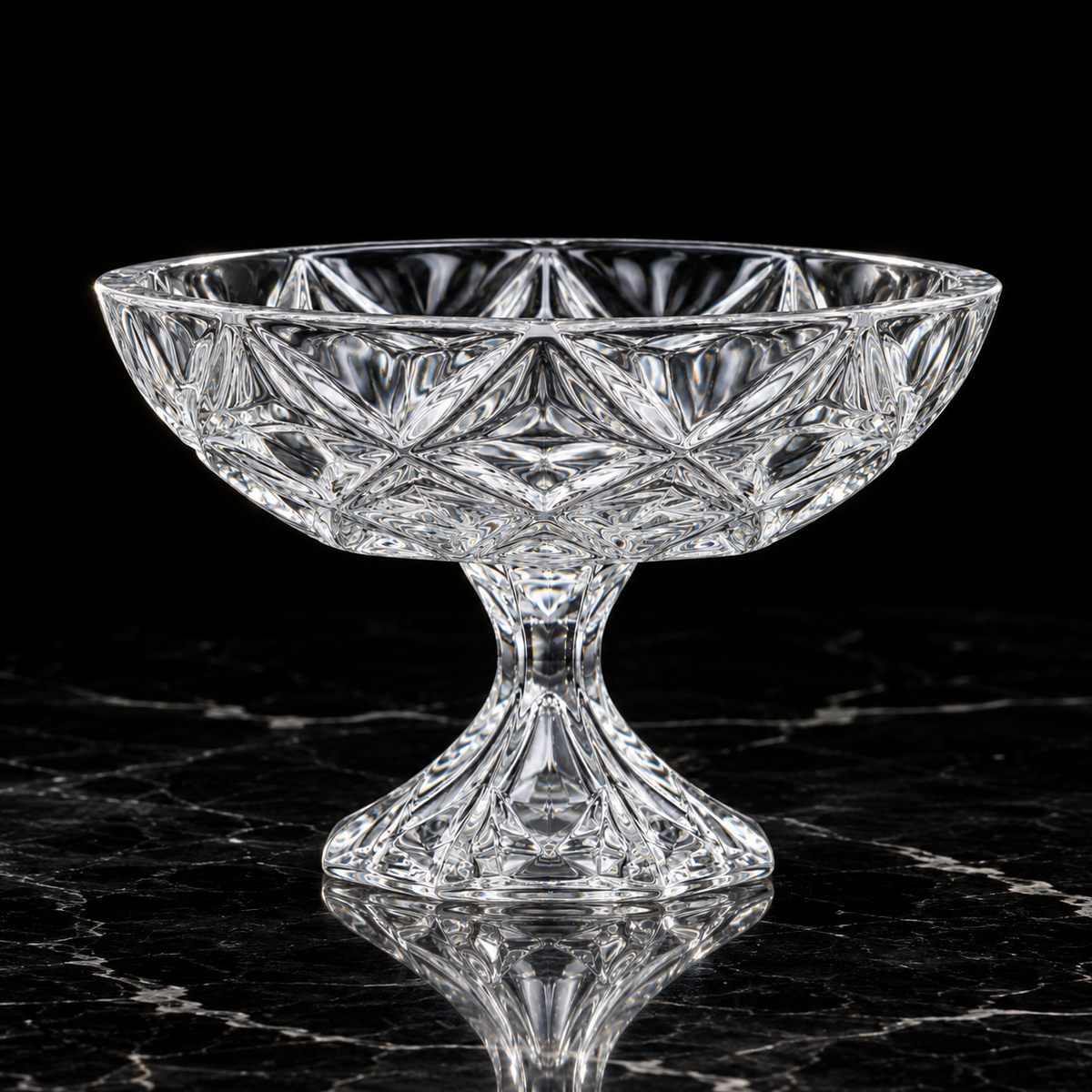 Crystal footed fruit bowl on black marble
