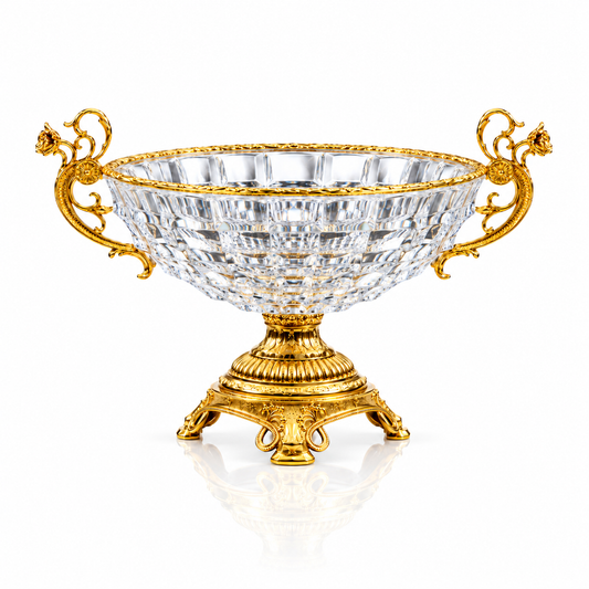 Crystal and gold footed fruit bowl with griffin handles on white