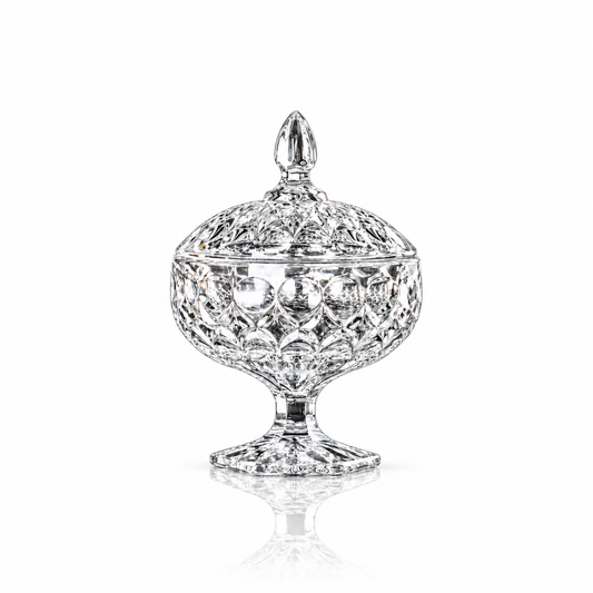 Crystal candy bowl with lid on white marble