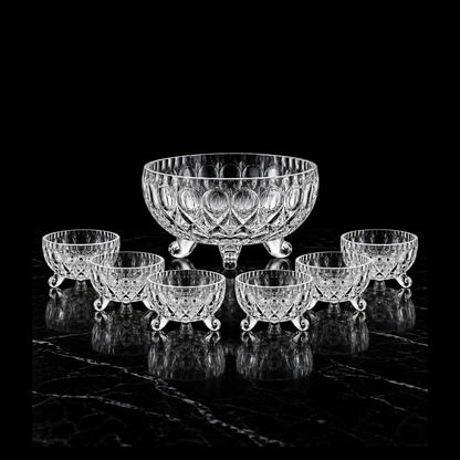 Teardrop-cut glass bowl set on black marble