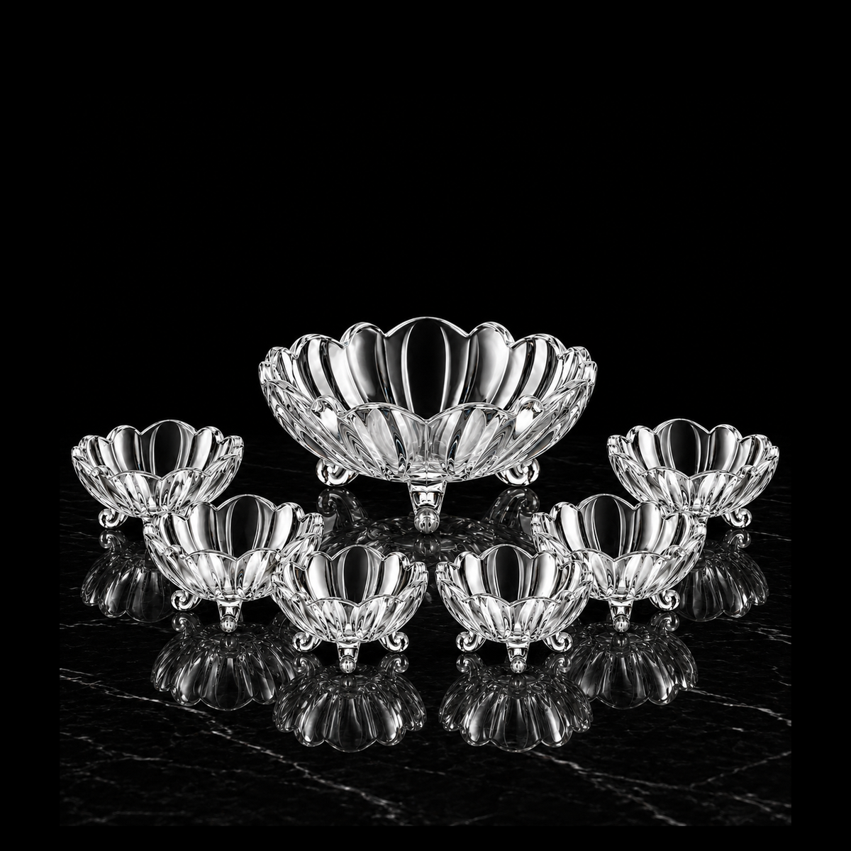 Wavy-rim glass bowl set on black marble
