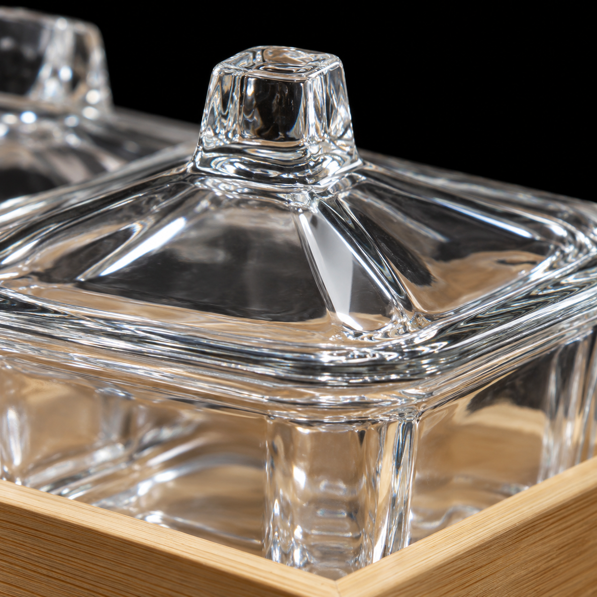 Close-up of glass pyramid lid and knob