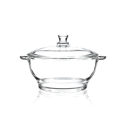 Tempered glass casserole with lid on white marble