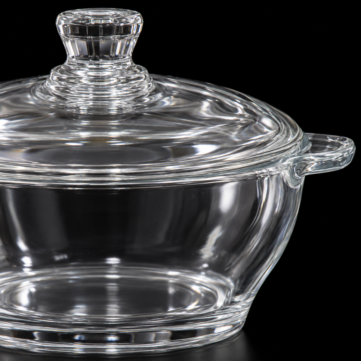 Close-up of glass casserole lid knob and handle