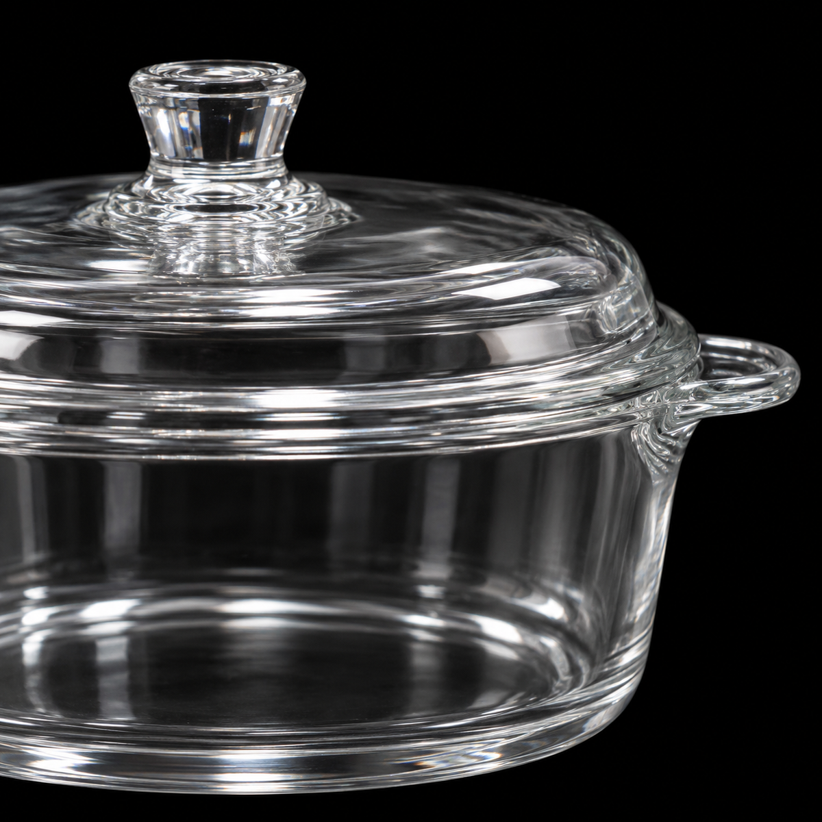 Close-up of glass casserole lid knob and handle