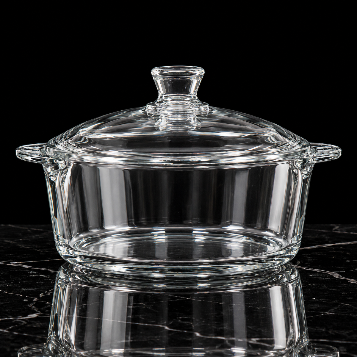 Tempered glass casserole with lid on black marble
