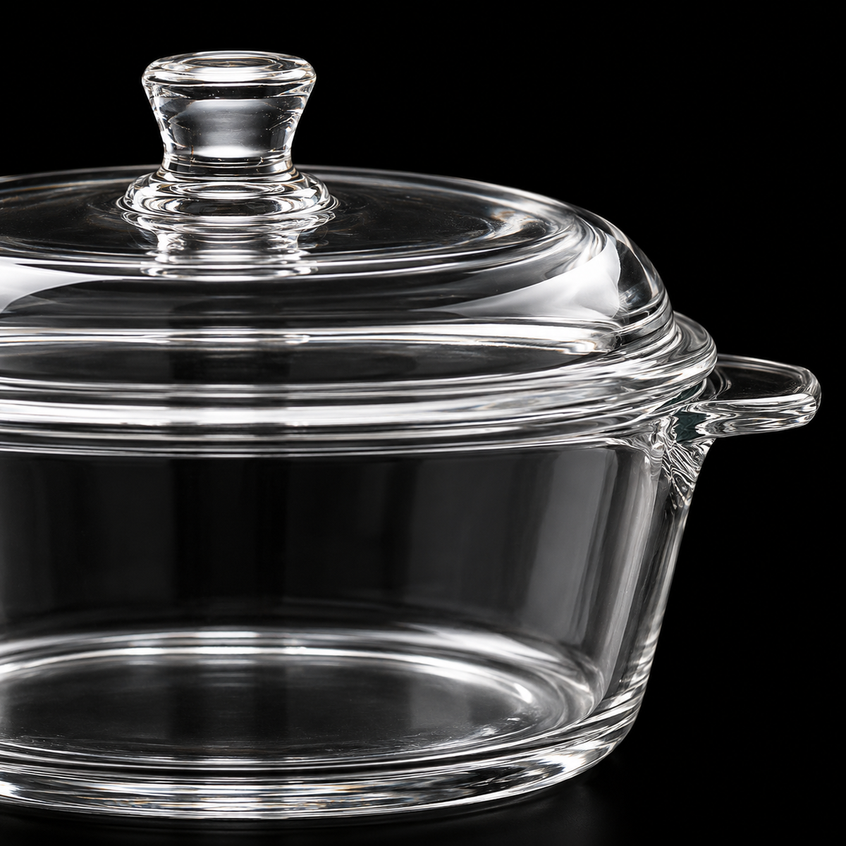 Close-up of glass casserole lid knob and handle