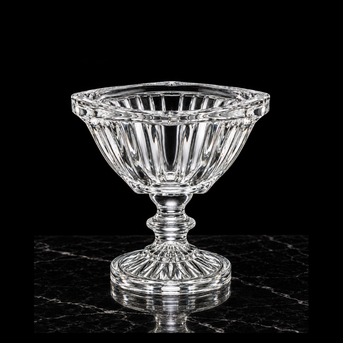 Fluted crystal footed bowl on black marble
