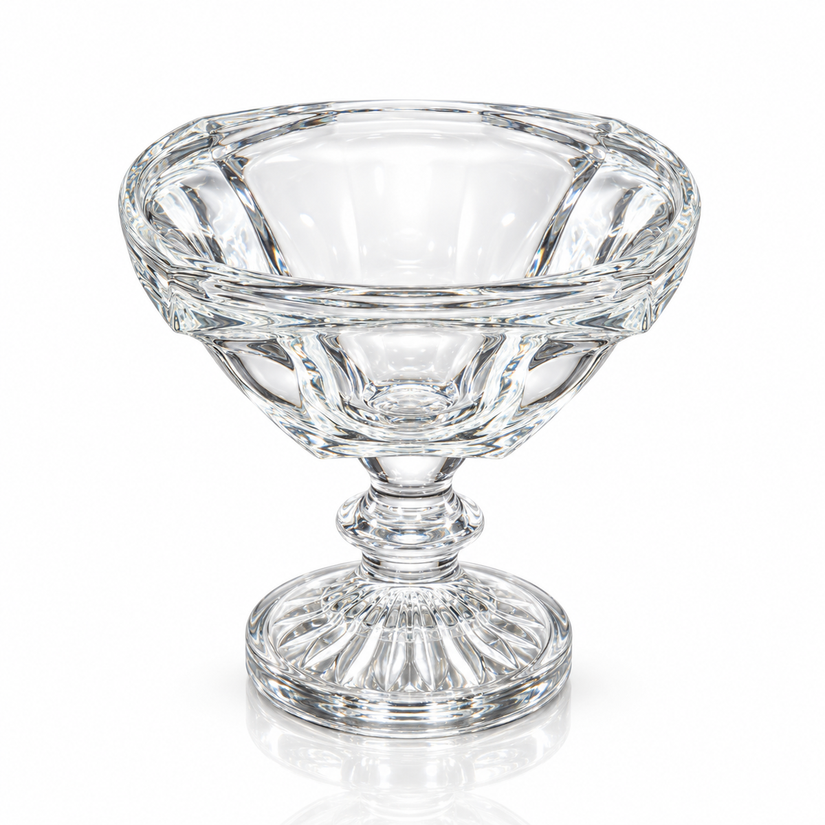 Footed crystal glass serving bowl on white marble