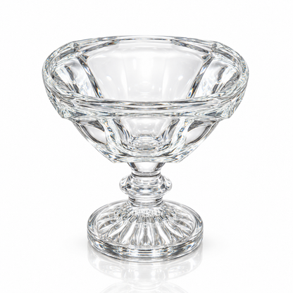 Footed crystal glass serving bowl on white marble