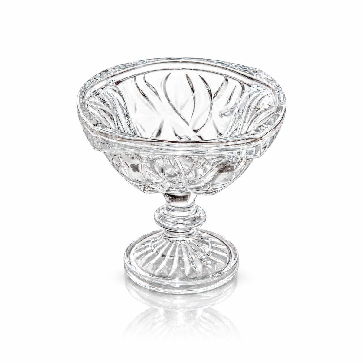 Swirl-cut footed crystal serving bowl on white marble