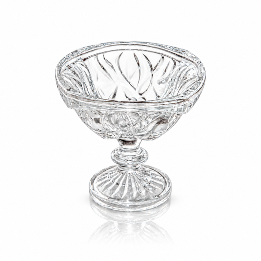 Swirl-cut footed crystal serving bowl on white marble