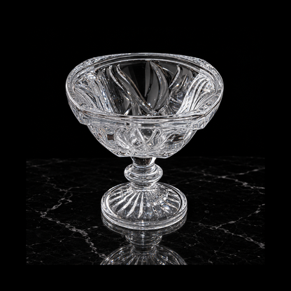 Swirl-cut crystal bowl on black marble