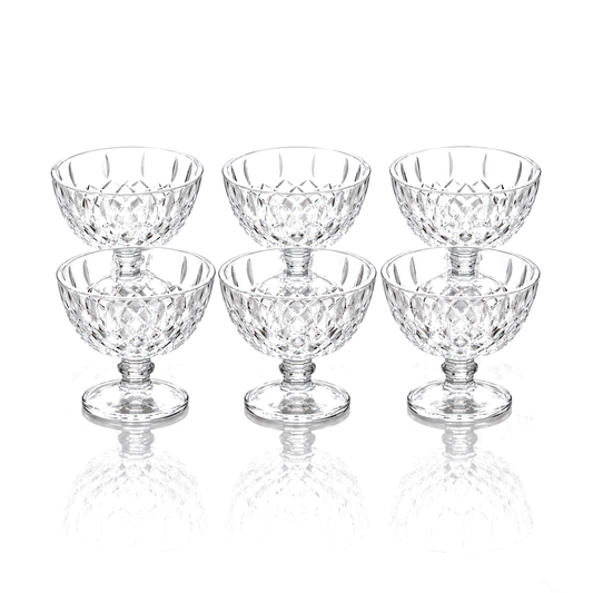 Set of 6 diamond-cut glass footed ice cream bowls on white marble