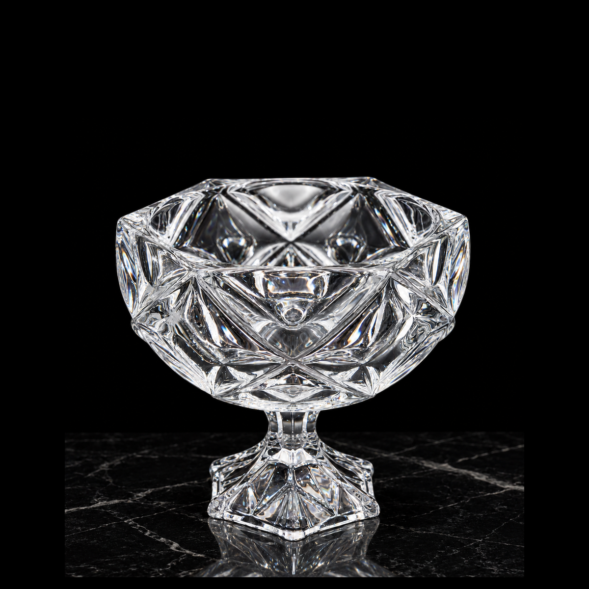 Crystal footed bowl on black marble