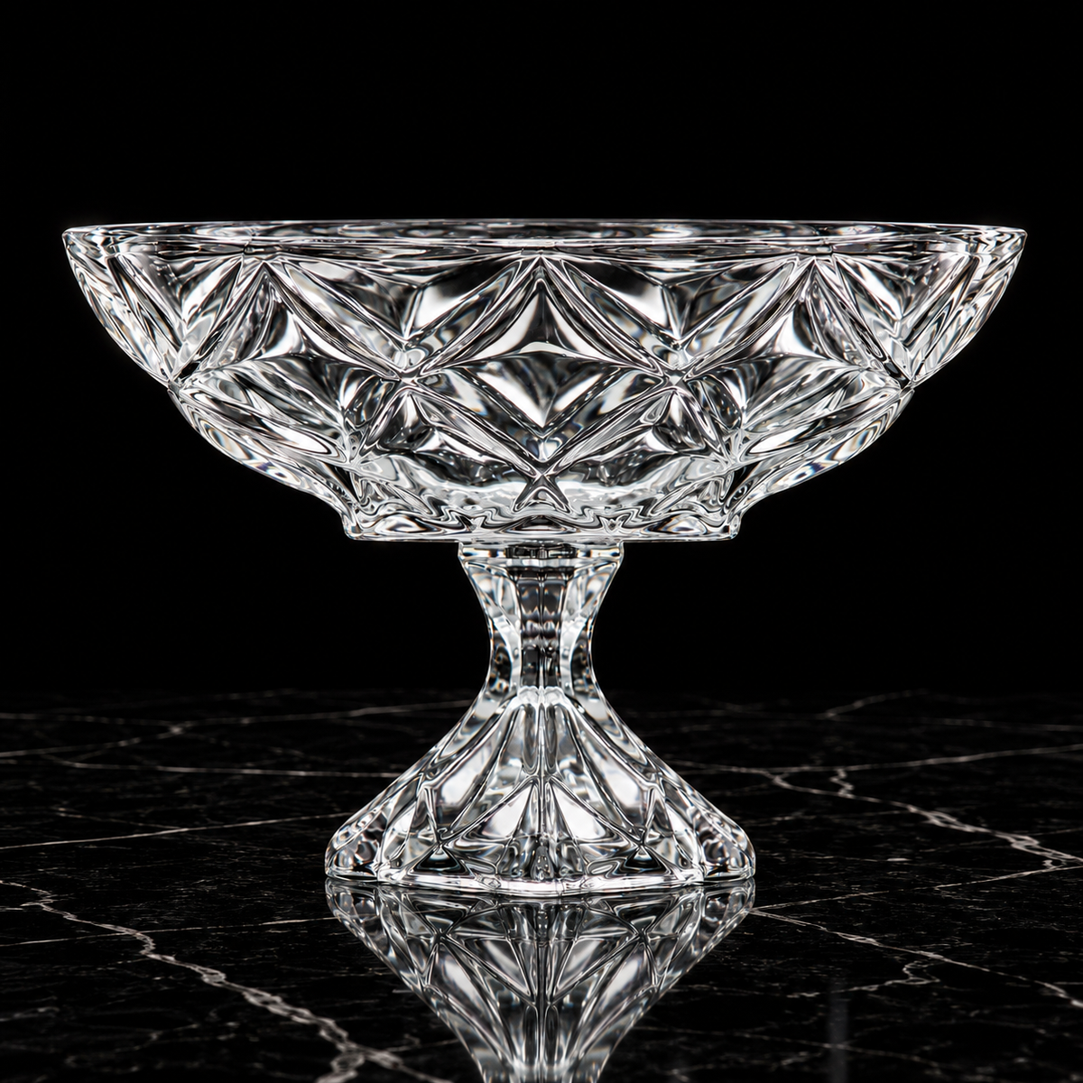 Crystal footed fruit bowl on black marble