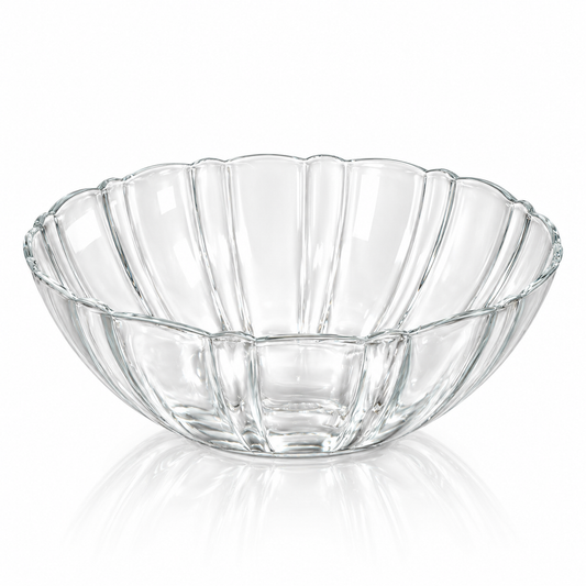 Fluted clear glass serving bowl with scalloped rim on white