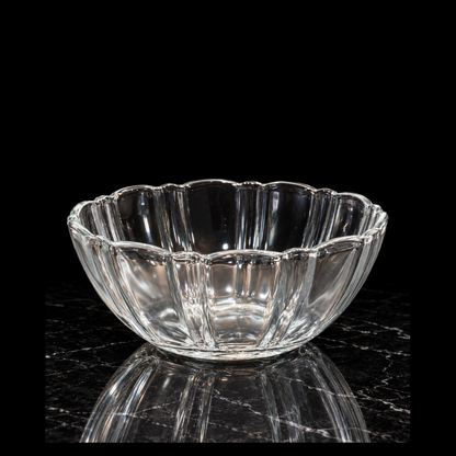 Fluted glass bowl on black marble