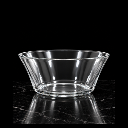 Clear glass bowl on black marble