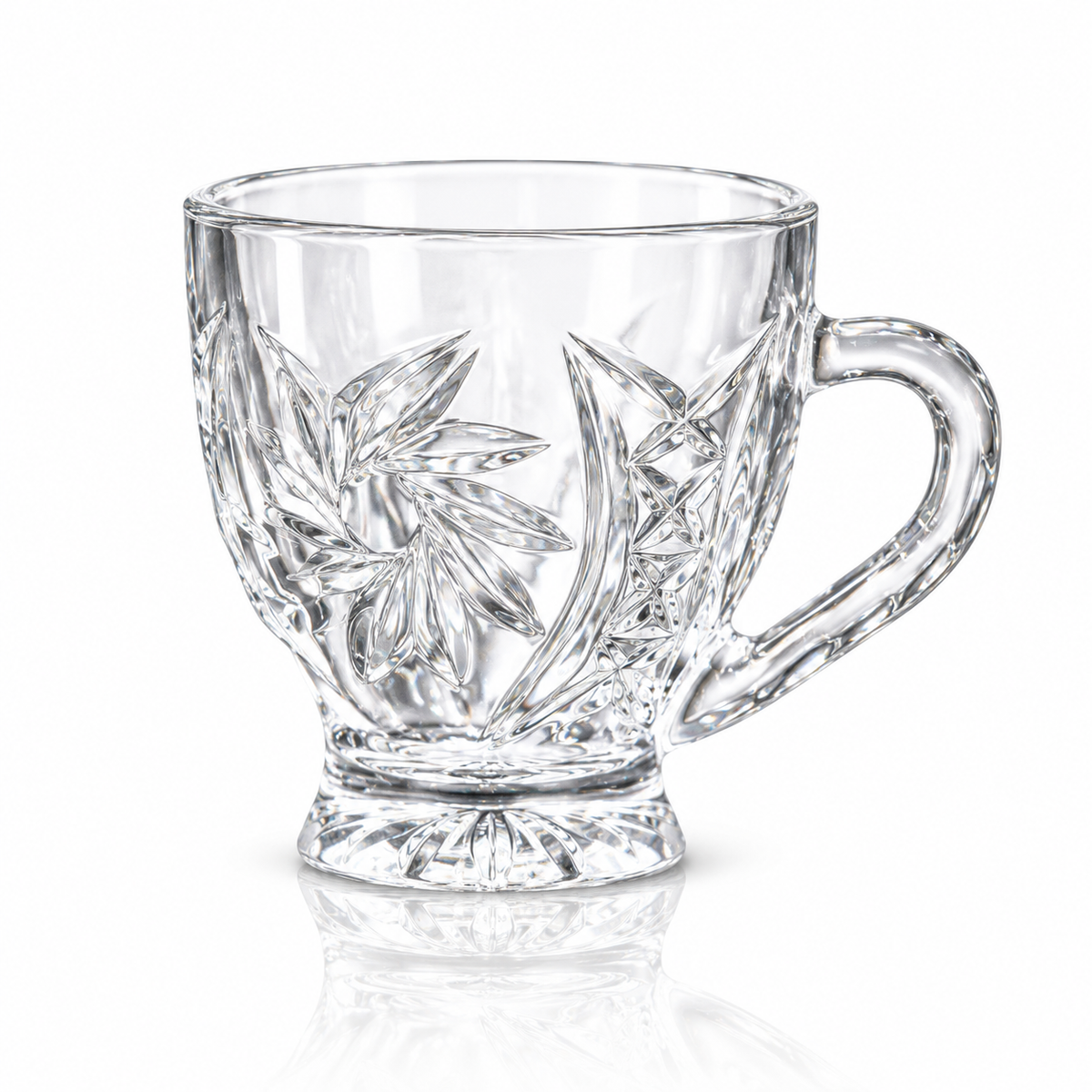 Set of 6 leaf-cut glass tea cups with handles on white marble