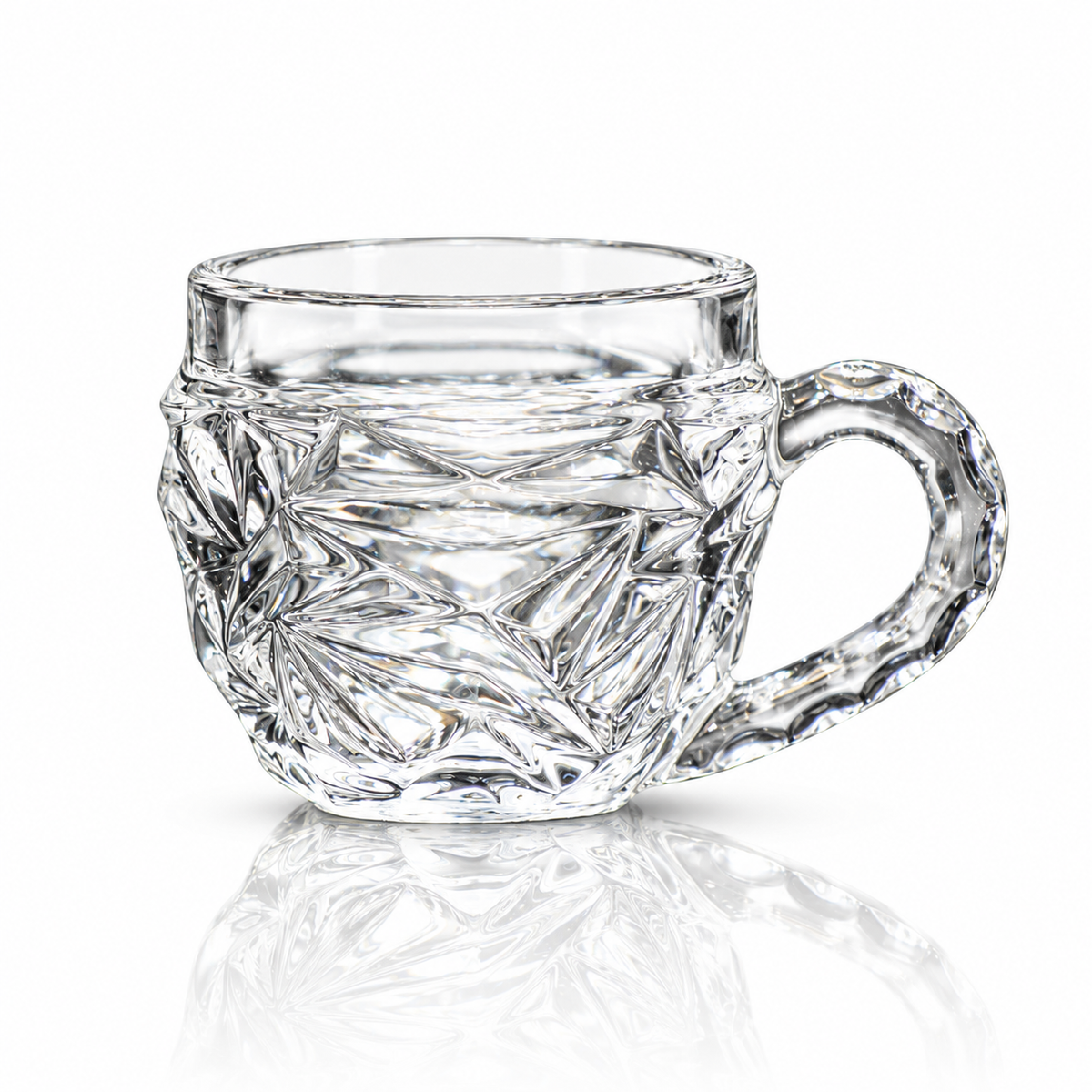 Set of 6 starburst-cut glass tea cups with handles on white marble