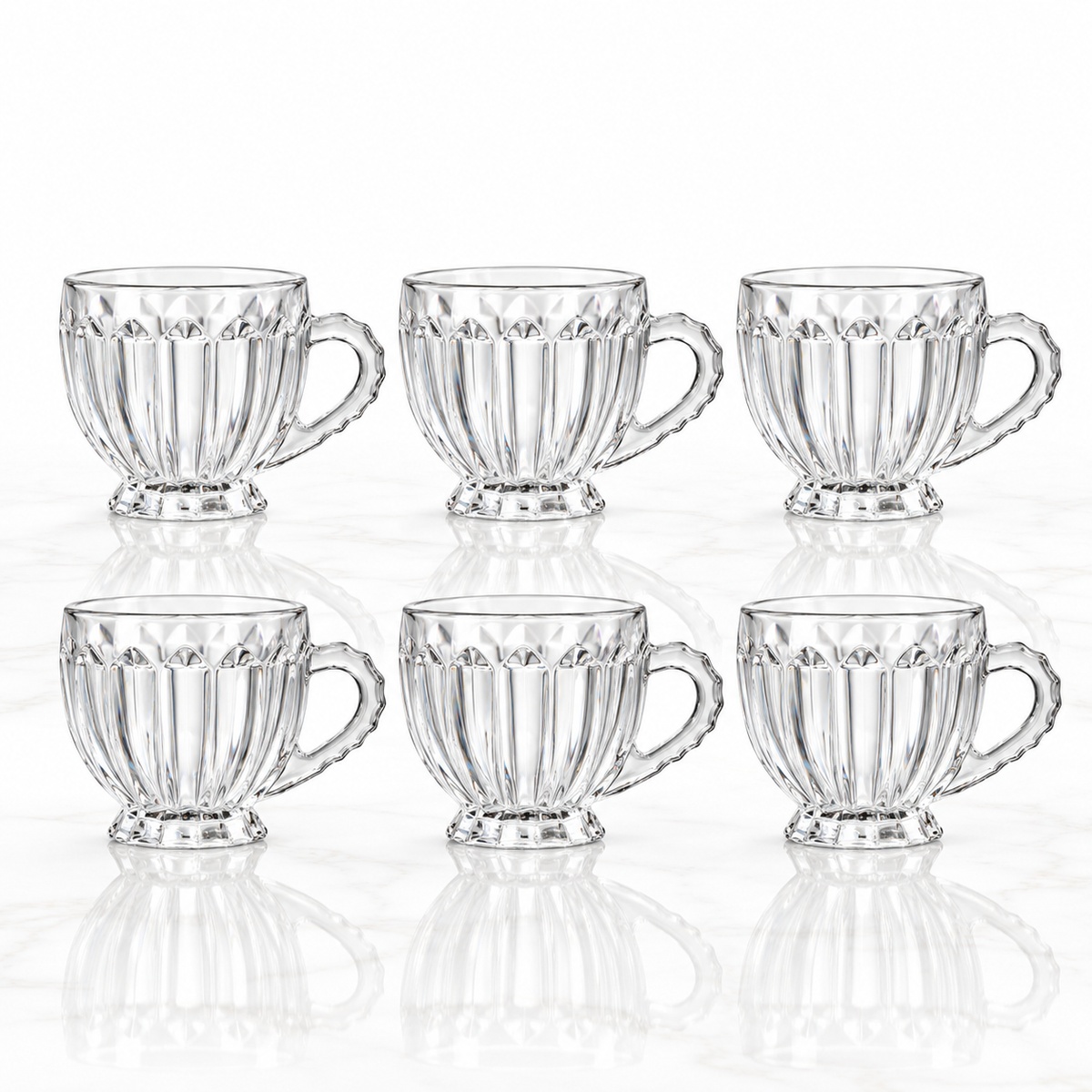 Set of 6 ribbed glass tea cups with handles on white marble
