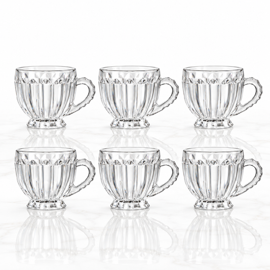 Set of 6 ribbed glass tea cups with handles on white marble