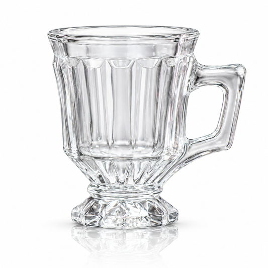 Set of 6 paneled pedestal glass tea cups on white marble