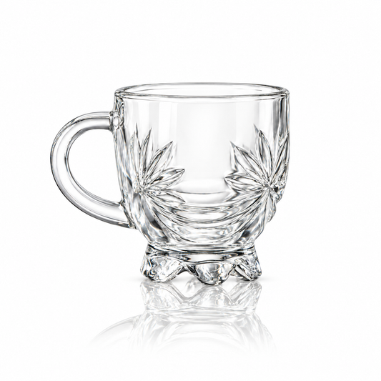 Set of 6 starburst-cut glass tea cups on white marble