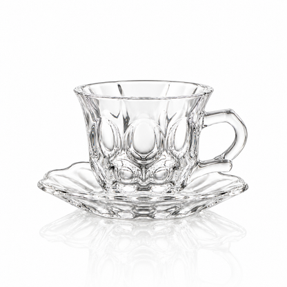 Oval bubble glass tea cup and saucer on white