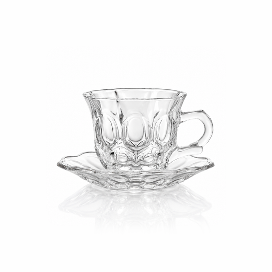 Oval bubble glass tea cup and saucer on white