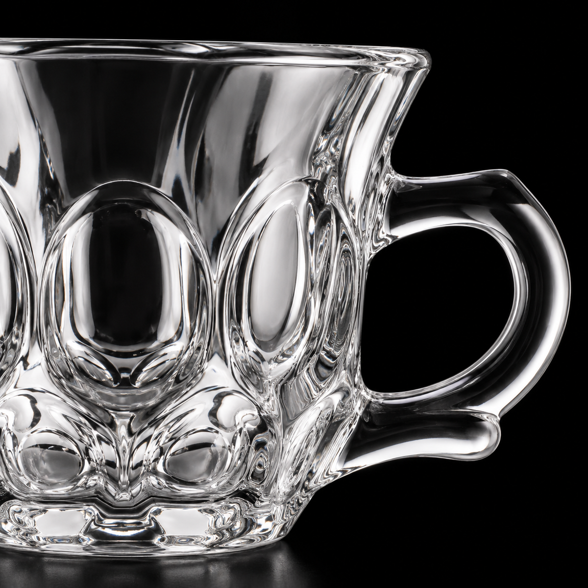 Close-up of oval bubble glass relief and handle