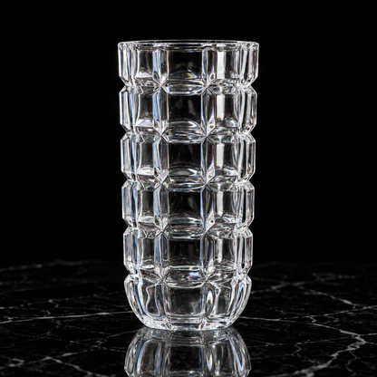 Crystal block-cut flower vase on black marble