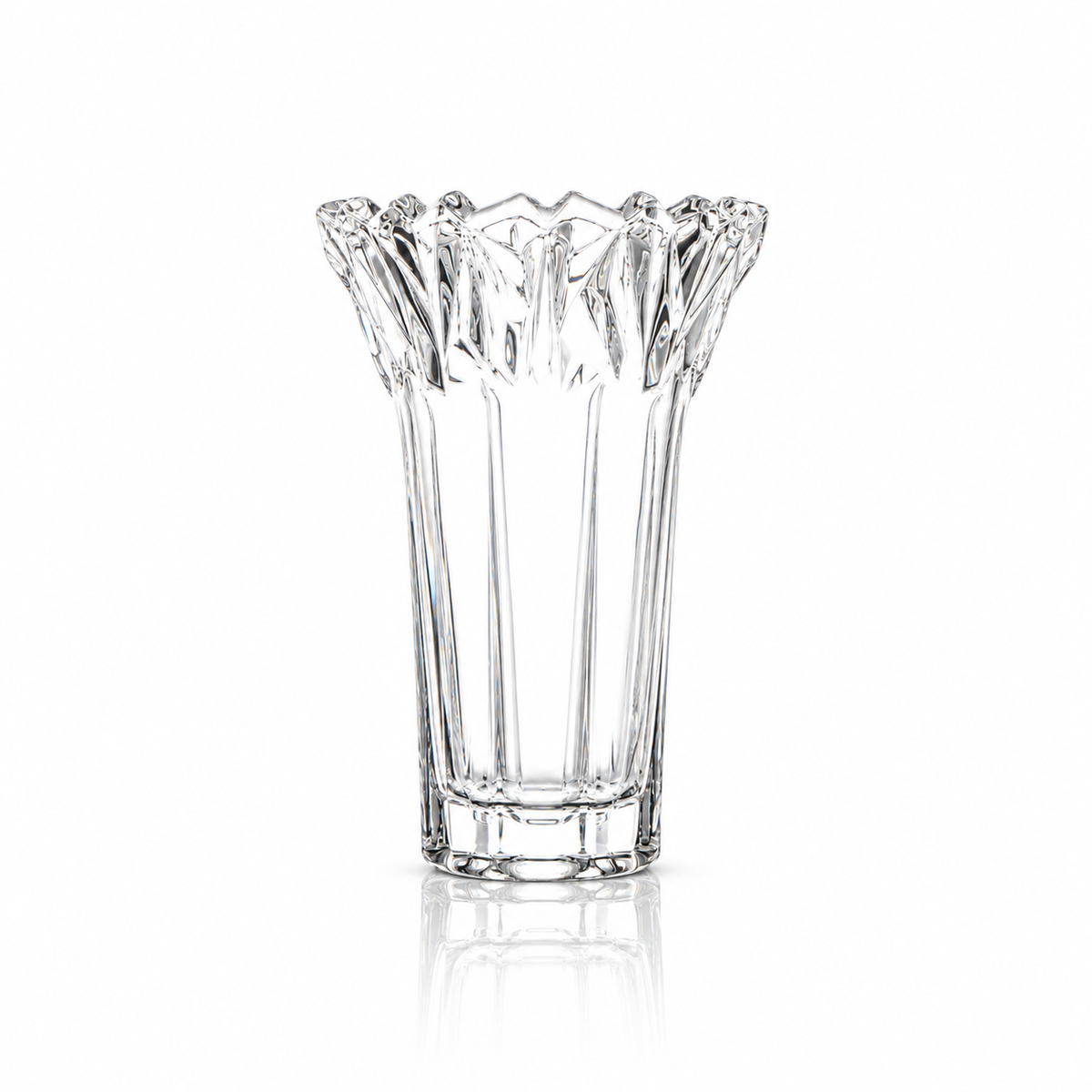 Crystal flower vase with jagged crown rim on white marble
