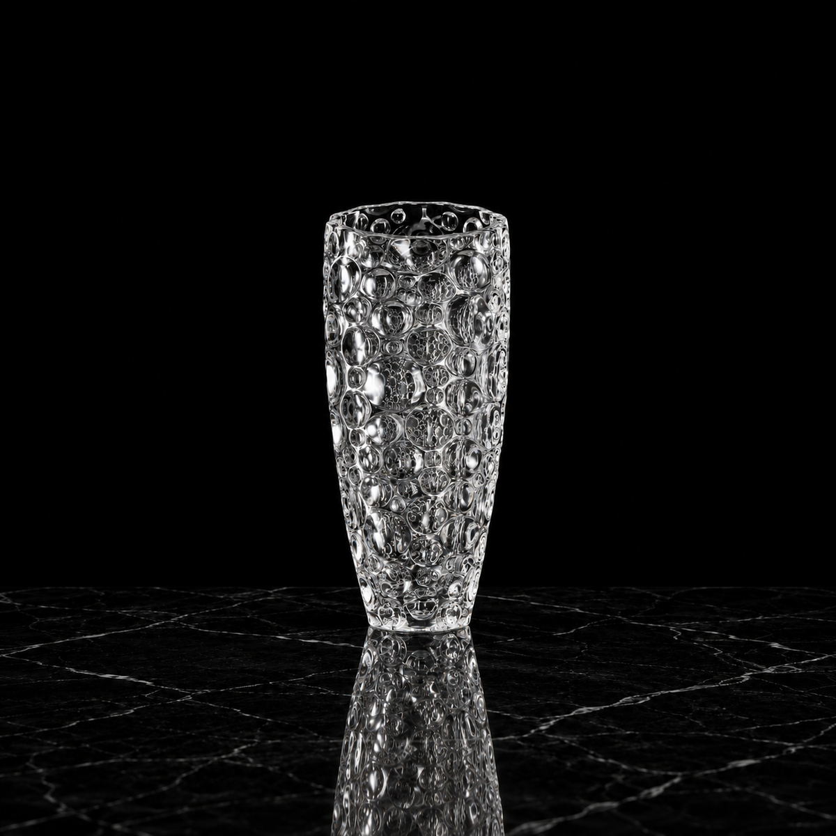 Crystal flower vase on black marble