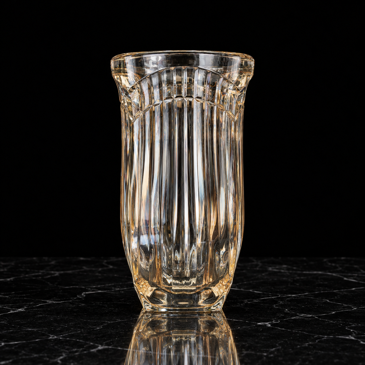 Champagne crystal vase on black marble