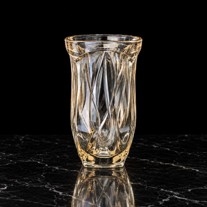 Champagne crystal vase on black marble