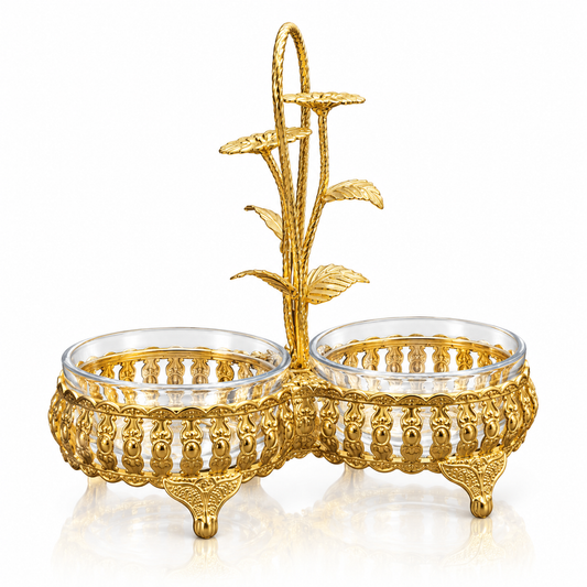 Gold filigree double serving dish with flower handle on white