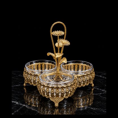 Gold triple serving dish on black marble